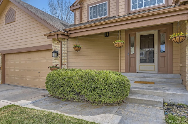 doorway to property featuring roof with shingles