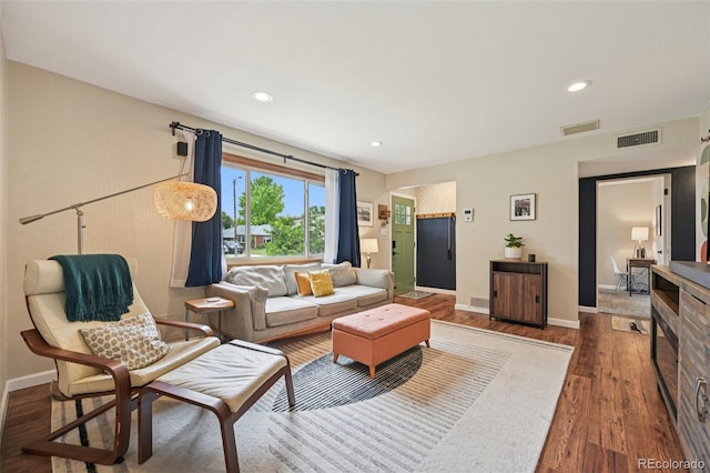 9150 Fir Dr, Thornton, CO 80229 - living room featuring wood finished floors and recessed lighting