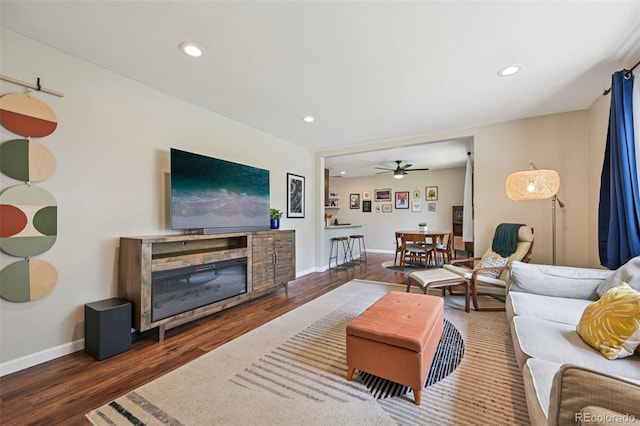 9150 Fir Dr, Thornton, CO 80229 - living room featuring wood finished floors, ceiling fan, and recessed lighting