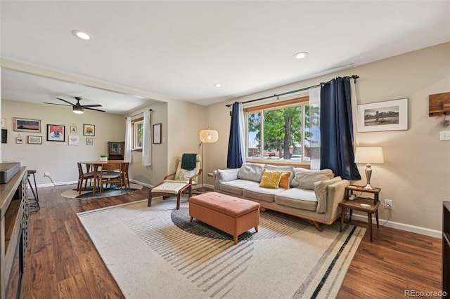 9150 Fir Dr, Thornton, CO 80229 - living area featuring dark wood finished floors, ceiling fan, and recessed lighting