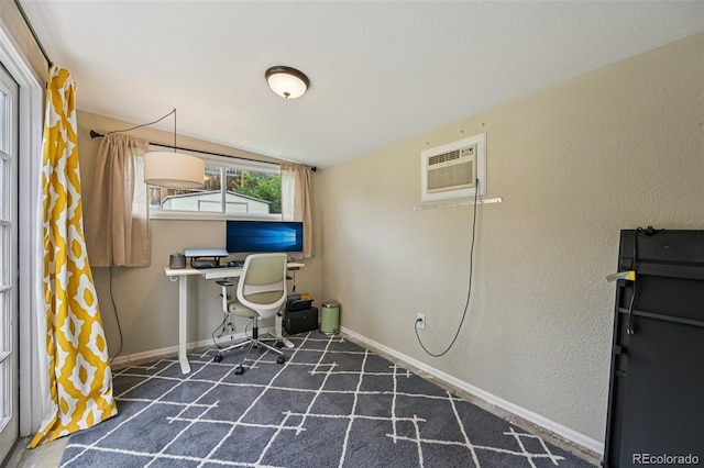 9150 Fir Dr, Thornton, CO 80229 - office space with dark colored carpet, a wall mounted AC, and a textured wall
