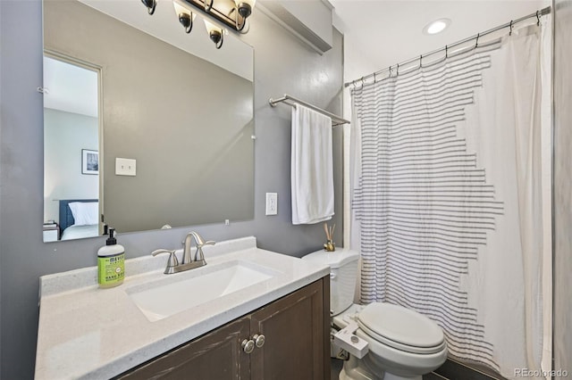 9150 Fir Dr, Thornton, CO 80229 - ensuite bathroom with vanity and a shower with shower curtain