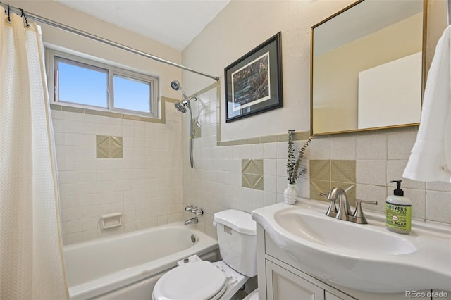 9150 Fir Dr, Thornton, CO 80229 - full bath featuring shower / tub combo with curtain, vanity, and tile walls