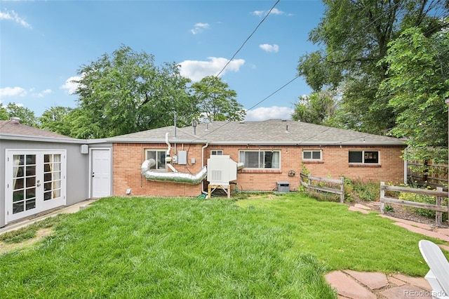9150 Fir Dr, Thornton, CO 80229 - back of house with brick siding and roof with shingles