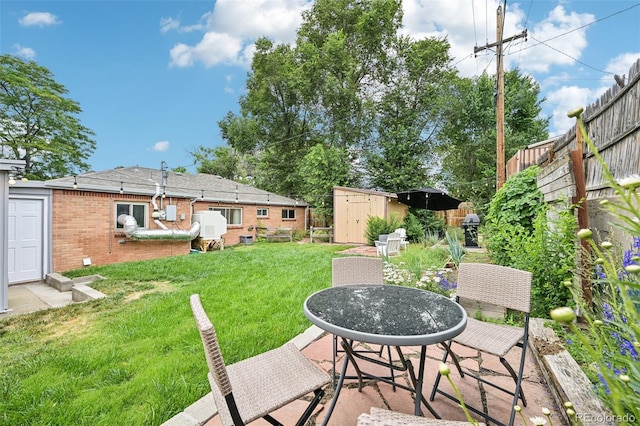 9150 Fir Dr, Thornton, CO 80229 - view of patio / terrace featuring a shed