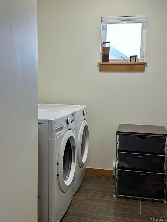 26 S Trailside Cir Unit A, Salida, CO 81201 - washroom with independent washer and dryer and dark wood-type flooring