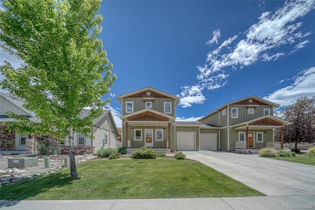 26 S Trailside Cir Unit A, Salida, CO 81201 - craftsman house with covered porch, a garage, a front lawn, and concrete driveway