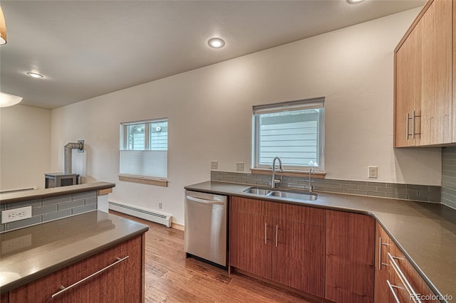 26 S Trailside Cir Unit A, Salida, CO 81201 - kitchen with dishwasher, baseboard heating, light wood-style flooring, tasteful backsplash, and recessed lighting