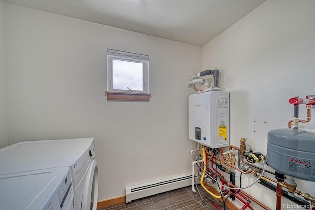 26 S Trailside Cir Unit A, Salida, CO 81201 - laundry area with baseboard heating, washer and clothes dryer, water heater, and dark wood-style flooring