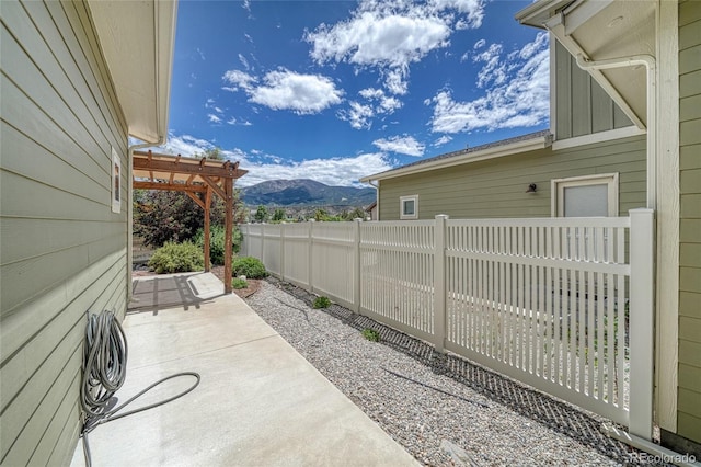 26 S Trailside Cir Unit A, Salida, CO 81201 - view of patio with a mountain view and a pergola
