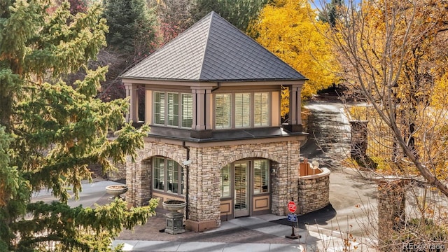 view of front of property featuring stone siding