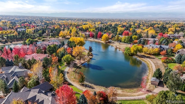 birds eye view of property featuring a water view