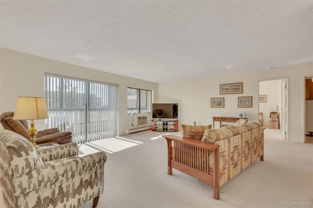 carpeted living room with a baseboard radiator and a textured ceiling