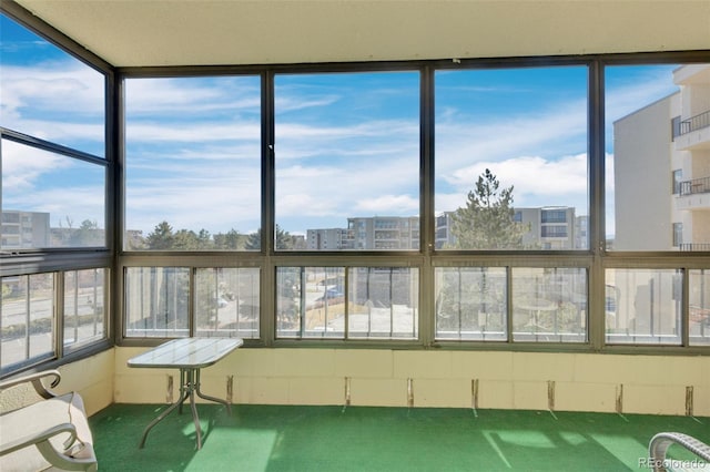 sunroom featuring plenty of natural light