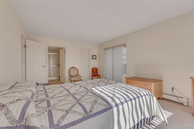 bedroom with light colored carpet and a baseboard heating unit