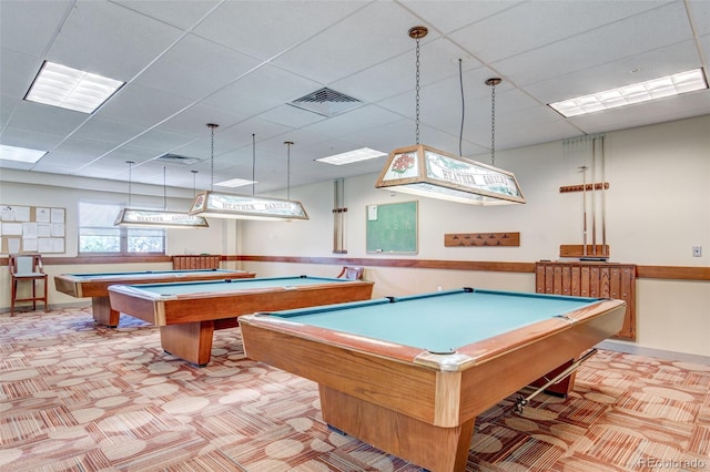 game room featuring light carpet, billiards, and a drop ceiling