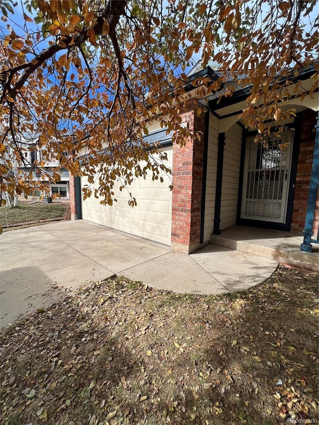5941 S Quail Way, Littleton, CO 80127 - garage featuring driveway