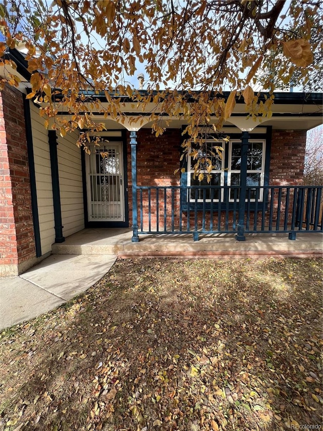 entrance to property with covered porch