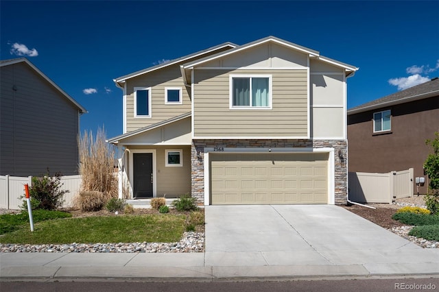 7568 Benecia Dr, Fountain, CO 80817 - view of front of property with stone siding, concrete driveway, and an attached garage