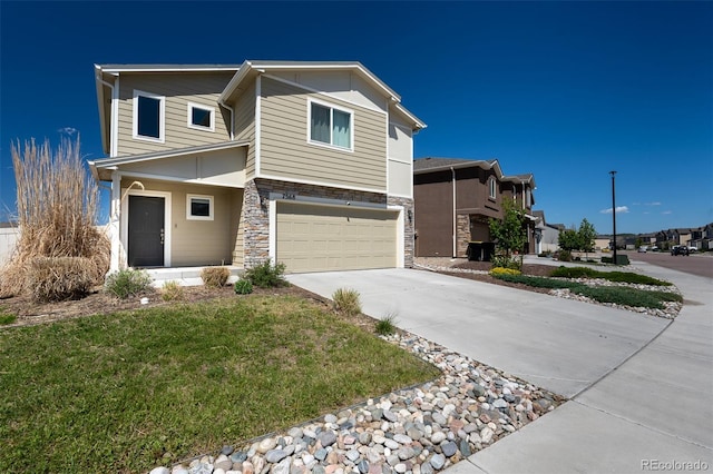 7568 Benecia Dr, Fountain, CO 80817 - view of front of house featuring a garage, concrete driveway, stone siding, and a front yard
