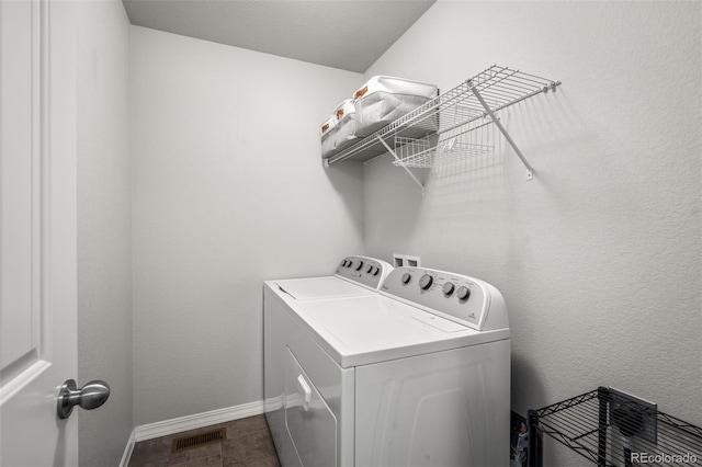 7568 Benecia Dr, Fountain, CO 80817 - laundry area featuring washing machine and dryer and baseboards