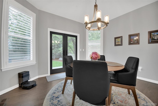 877 Eldorado Dr, Superior, CO 80027 - dining space with a chandelier, french doors, dark wood-type flooring, and baseboards