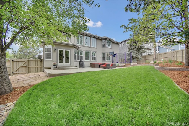 877 Eldorado Dr, Superior, CO 80027 - back of house with french doors, stucco siding, a patio, an outdoor hangout area, and entry steps