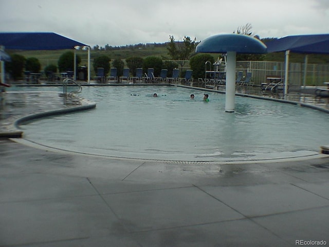877 Eldorado Dr, Superior, CO 80027 - community pool featuring a patio area