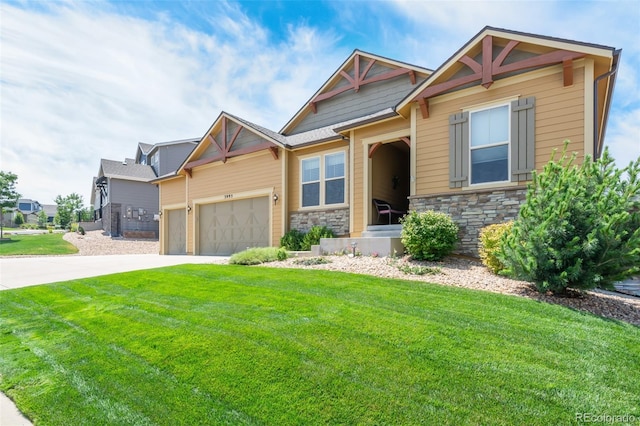 craftsman house with a front yard and a garage