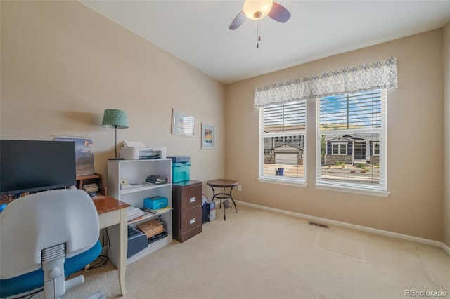 office featuring ceiling fan and light colored carpet