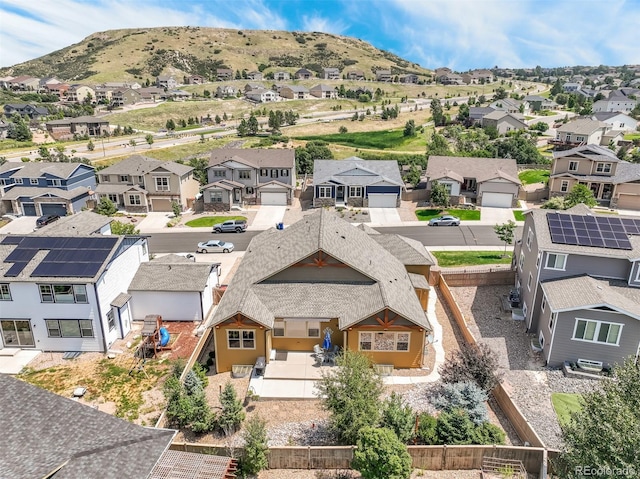 drone / aerial view featuring a mountain view