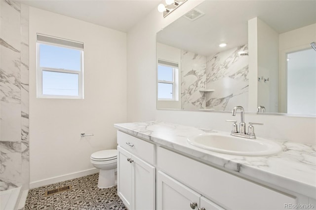 503 S Rollie Ave Unit 13C, Fort Lupton, CO 80621 - bathroom with vanity and a marble finish shower