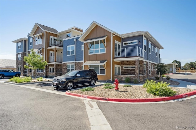 290 S Cherrywood Dr Unit 202, Lafayette, CO 80026 - view of property with uncovered parking
