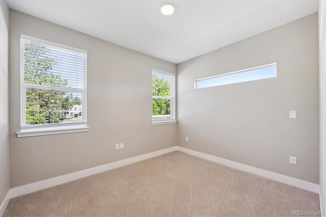 290 S Cherrywood Dr Unit 202, Lafayette, CO 80026 - carpeted empty room featuring baseboards