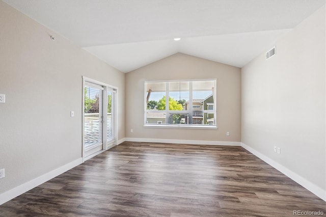 290 S Cherrywood Dr Unit 202, Lafayette, CO 80026 - unfurnished room with lofted ceiling and dark wood finished floors