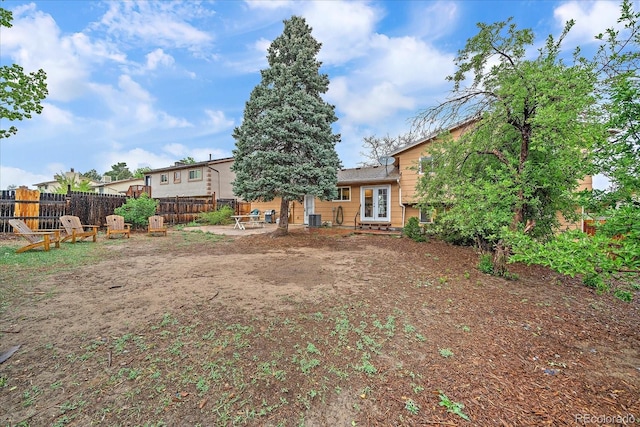 view of yard with fence and a patio