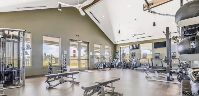 gym featuring ceiling fan and high vaulted ceiling