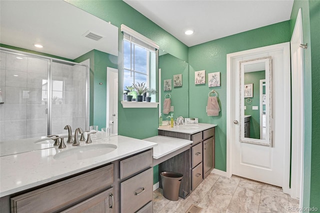 bathroom featuring vanity and walk in shower