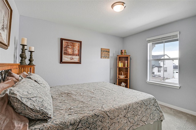 bedroom featuring carpet