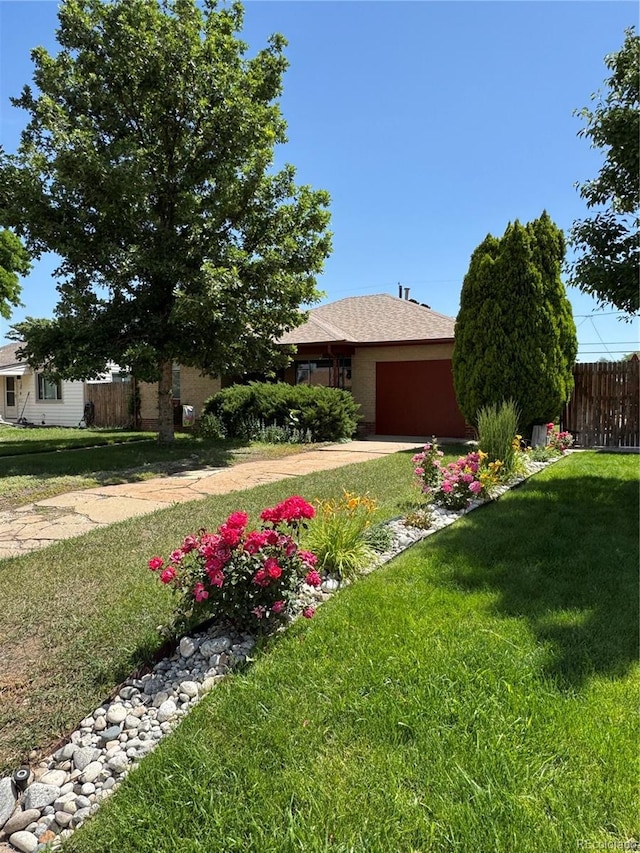460 Yates St, Denver, CO 80204 - view of front of home featuring an attached garage and driveway