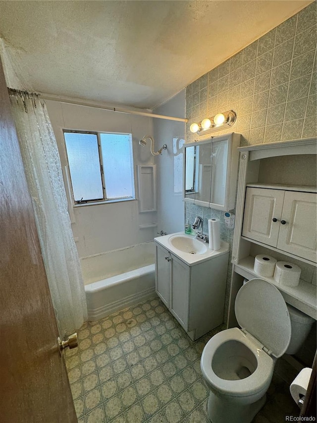 460 Yates St, Denver, CO 80204 - full bathroom with vanity, shower / bath combination with curtain, a textured ceiling, and tile patterned floors
