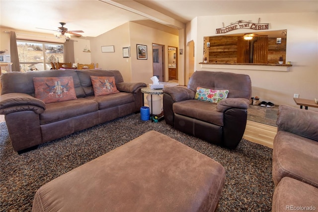 living room featuring hardwood / wood-style floors and ceiling fan