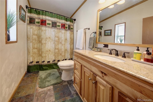 bathroom featuring vanity, lofted ceiling, a shower with shower curtain, toilet, and ornamental molding