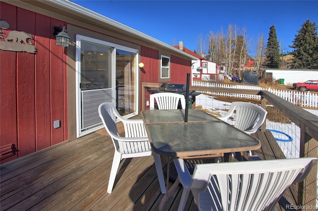 view of snow covered deck