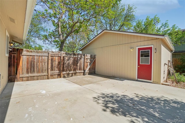 view of outdoor structure with fence