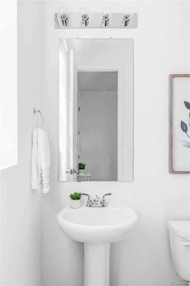 6117 Easton Cir, Frederick, CO 80504 - bathroom featuring toilet and a sink