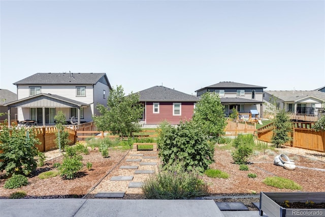 6117 Easton Cir, Frederick, CO 80504 - view of yard featuring a vegetable garden and a residential view