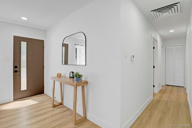 3055 S Winona Ct, Denver, CO 80236 - hallway featuring light wood finished floors and recessed lighting
