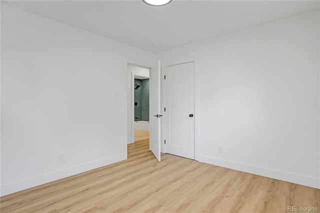 3055 S Winona Ct, Denver, CO 80236 - spare room featuring baseboards and wood finished floors