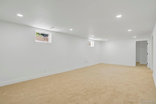 3055 S Winona Ct, Denver, CO 80236 - basement featuring light colored carpet, recessed lighting, and plenty of natural light